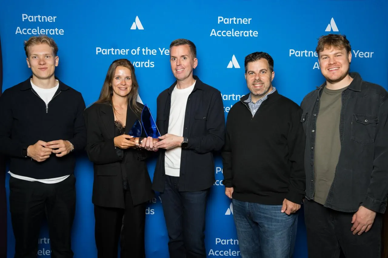 The Aura Apps team with the Atlassian Partner of the Year 2026 award for Marketplace Rising Star